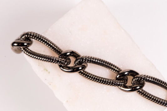 creation of chains for coats for high fashion